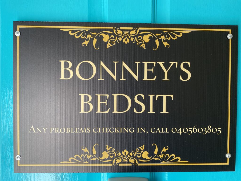 Bonney's Bedsit is marked with a lovely sign